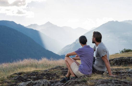 Couple enjoys the mountain panorama